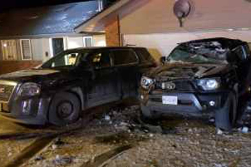 Cheryl Chew’s Tacoma truck and SUV were both totalled after a car flew almost 10 metres off a frozen snow heap into the vehicles on Golf Course Drive in Blind Bay the night of Sunday, March 15. (Contributed)
