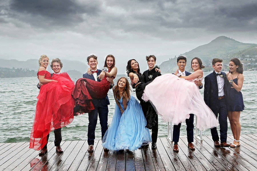 Eleven members of Fulton Secondary’s Class of 2020, Tori Hauptman (from left), Quin Williamson, Ethan Schiman, Emily Lehoux, Keaira Korberg, Sara Mann, Aiden Trottier, Karan Malhotra, Dylan Beaumont, Hayden Catt, and Vernon Secondary School Grade 11 date Emma Baycroft, brave the rain and unseasonably cold temperature for a fantastic memory of what’s been a trying year for all Class of 2020 members Saturday, June 13, at Kal Beach. (Lisa Mazurek - photo)