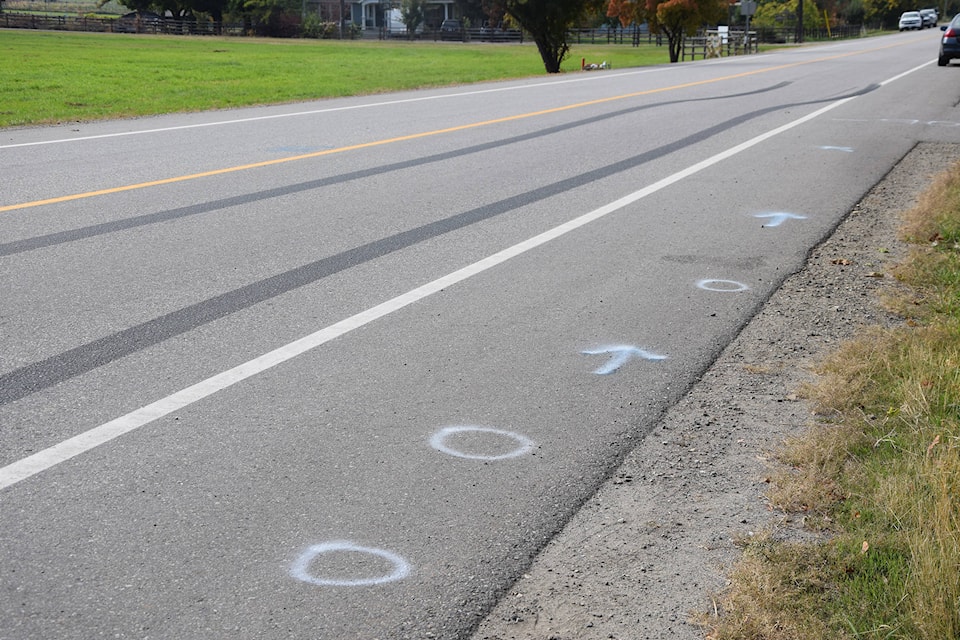 Vernon North Okanagan RCMP responded to reports of a man in medical distress Oct. 1, 2020. An investigation closed Kalamalka Road around Howe Drive for several hours. Spray paint marks reddish stains along the roadway. (Caitlin Clow - Vernon Morning Star)
