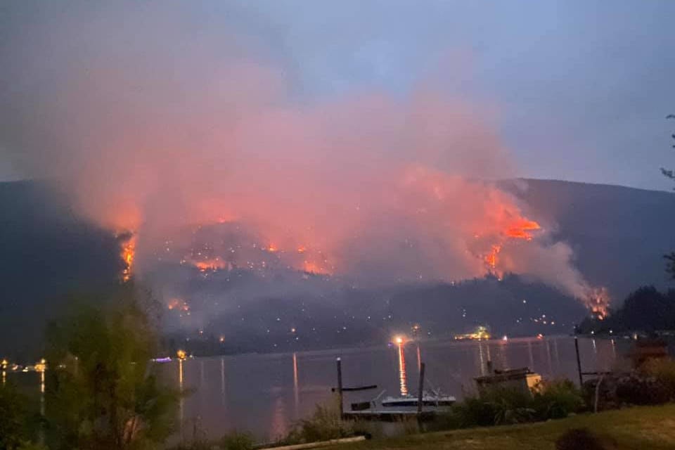 The 2 Mile Road wildfire burning on Tuesday evening, July 20. (Hannah Byron photo)
