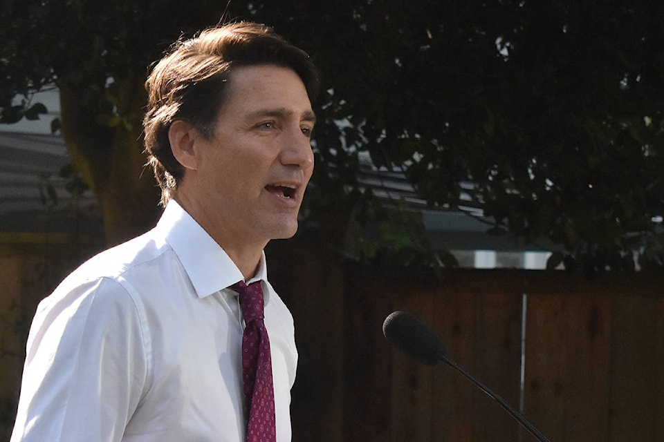 Liberal Leader Justin Trudeau and South Surrey-White Rock candidate Gordie Hogg speak at a campaign event in South Surrey Wednesday. (Aaron Hinks photo)