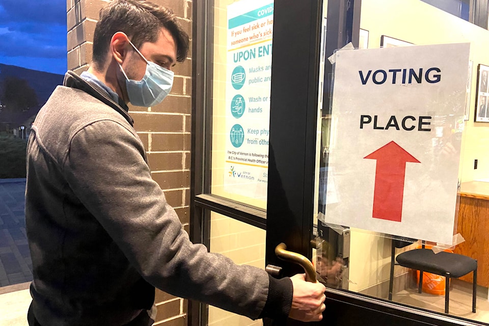 Brendan Shykora makes his first mark in a municipal election during the last day of advance voting Thursday at Vernon Council chambers. (Jennifer Smith - Morning Star)
