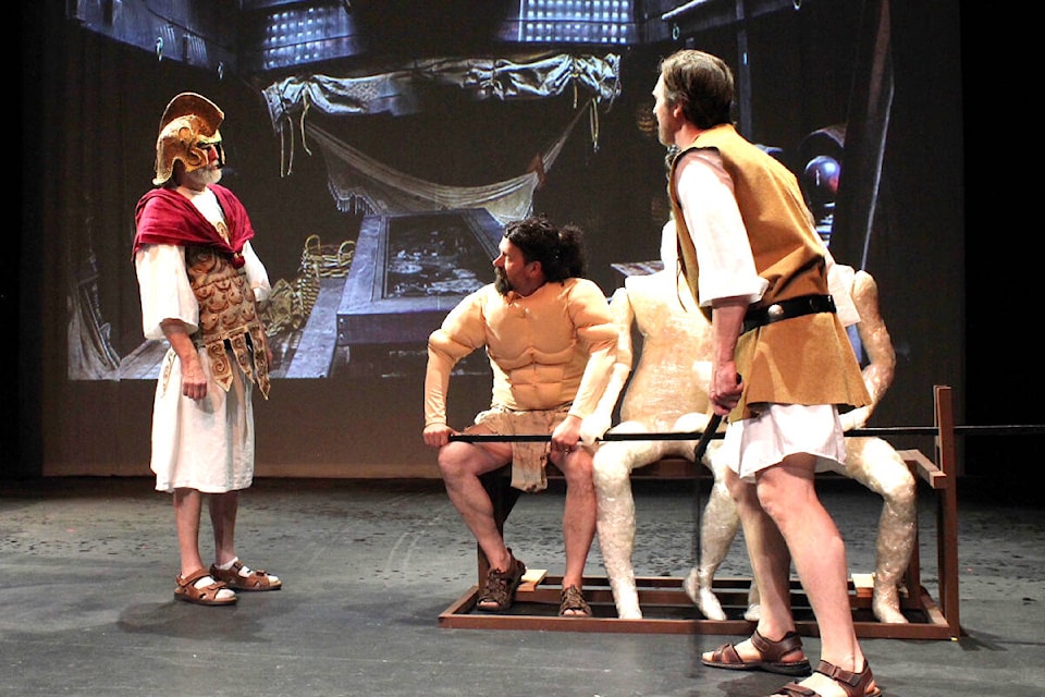 John Lomas (from left), Gabriel Newman and Cliff Lattery rehearse a scene from Ben Hur, the latest production of Vernon’s Powerhouse Theatre, with shows running in May. (Kelly Winston photo)