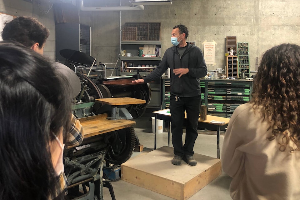 Okanagan College professor Jason Dewinetz gives Grade 10 and 11 students a taste of the Writing and Publishing diploma program at Experience OC May 4, 2022. (Brendan Shykora - Morning Star)