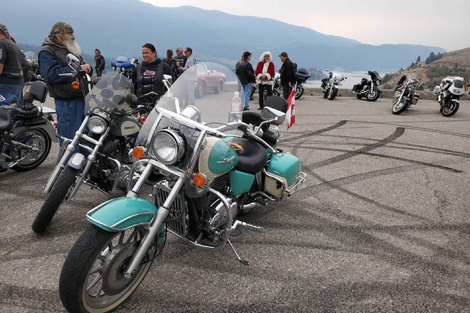 Santa Claus (Rod Mallett, at rear) led more than 100 bikes and riders on the 34th annual Santas Anonymous Society North Okanagan Motorcycle Toy Run Sunday, Sept. 11, at the Kal Lake Lookout. The event this year was held in memory of Mallett’s wife, Judy, a founding society member who died in 2020. (Roger Knox - Morning Star)