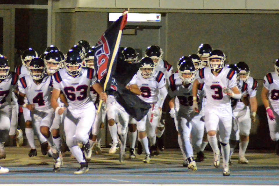 The Vernon Panthers race on to the field at Greater Vernon Athletic Park for their Interior AA Senior Varsity High School Football Conference exhibition showdown with their crosstown rivals, the Fulton Maroons, Friday, Oct. 7. (Darren Hove Photo)