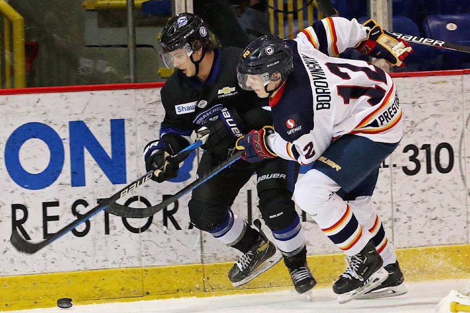 Vernon Vipers forward Max Borovinskiy (right) rubs out Wenatchee’s Gabe Dombrowski along the Kal Tire Place boards. Borovinskiy scored the game-winner as the Vipers beat the Wild 4-2 in BCHL action Saturday, Dec. 2. (Lisa Mazurek - Vernon Vipers Photography)