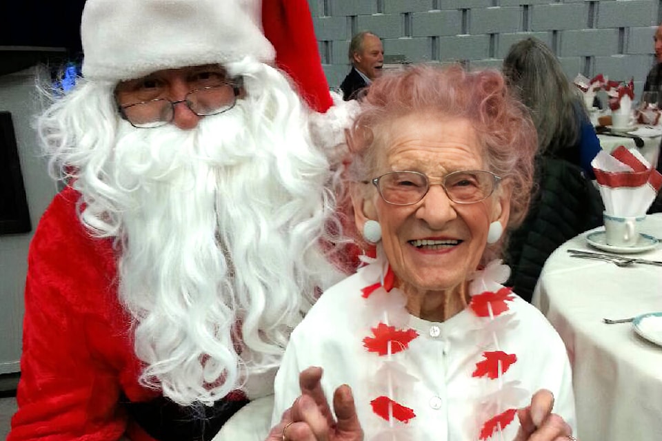 Two legends, one photo. Santa Claus hears the wish list from soon-to-be 100-year-old Helen Sidney, Vernon’s famous debris picker-upper during her daily walks along Bella Vista Road. Sidney, who turns 100 Christmas Eve, was among the guests at the return of the Halina Centre’s Seniors Christmas Luncheon Wednesday, Dec. 7, at the Vernon Rec Centre Auditorium. (Betty Tanaka Photo)