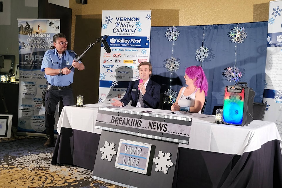 Vernon Winter Carnival Society director Boris Ivanoff, left, dressed as Officer Ponch from the hit TV series CHiPs, holds the boom microphone for guest speaker Curt Reimer of event sponsor Valley First while Carnival executive director Vicki Proulx – Leela from Futurama – looks on during the Media Launch for the 63rd Carnival Wednesday, Jan. 11, at the Best Western Premier Hotel. (Roger Knox - Morning Star)