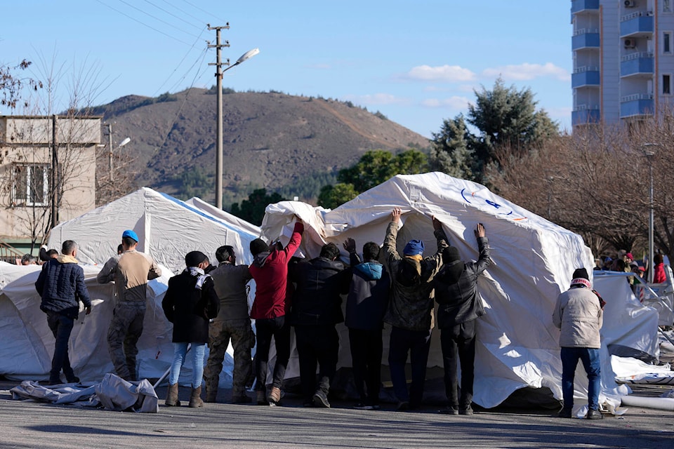 31823667_web1_230209-CPW-Rescue-team-hurdles-Turkey-tent_1