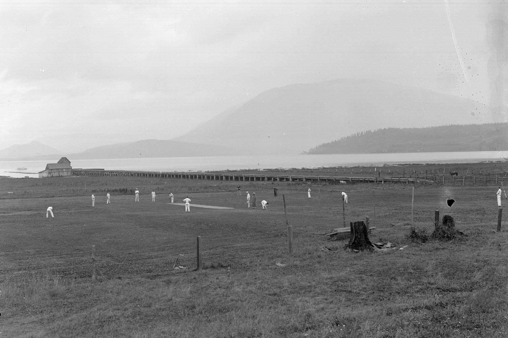 This Rex Lingford photo taken between 1909 and 1914 shows a group of men playing cricket by the Salmon Arm wharf against a backdrop of Shuswap Lake. (Image courtesy of the Archives @ R.J. Haney Heritage Village & Museum)