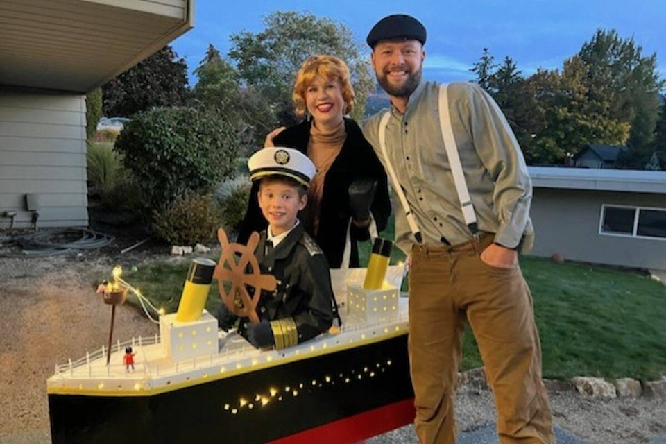Thomas, on Halloween with his parents, Eddie and Penny (Contributed).