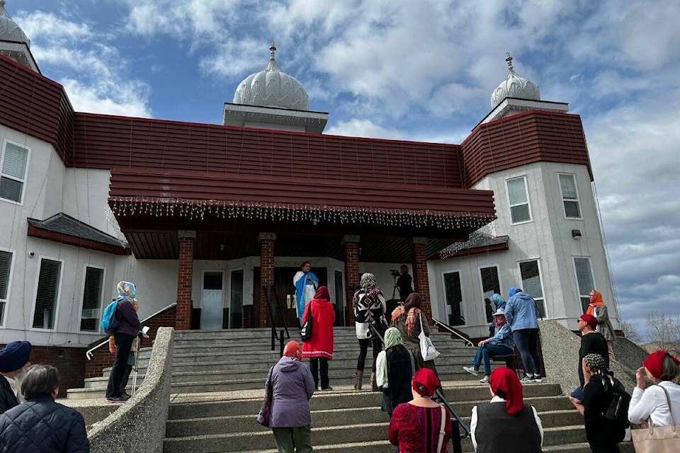 Patrons wait outside for the commencement of the Sikh Heritage celebration outside of the North Okanagan Sikh Society Gurdwara. (Bowen Assman - Morning Star).