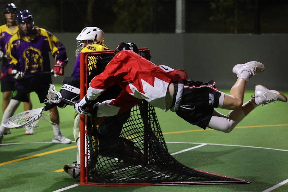 Vernon’s Adian Wattie tries to score from behind the goal against Nick Sheedy and the Adelaide Thunder during the 2023 Commonwealth Cup box lacrosse tournament in Melbourne, Austrialia. (Contributed)