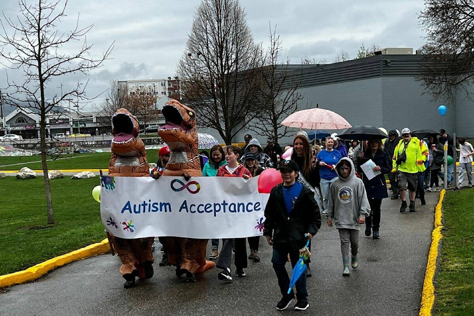 Attendees marched around Polson Park for the Autism Acceptance and Awareness Walk on Sunday, April 23 (Bowen Assman/Morning Star)
