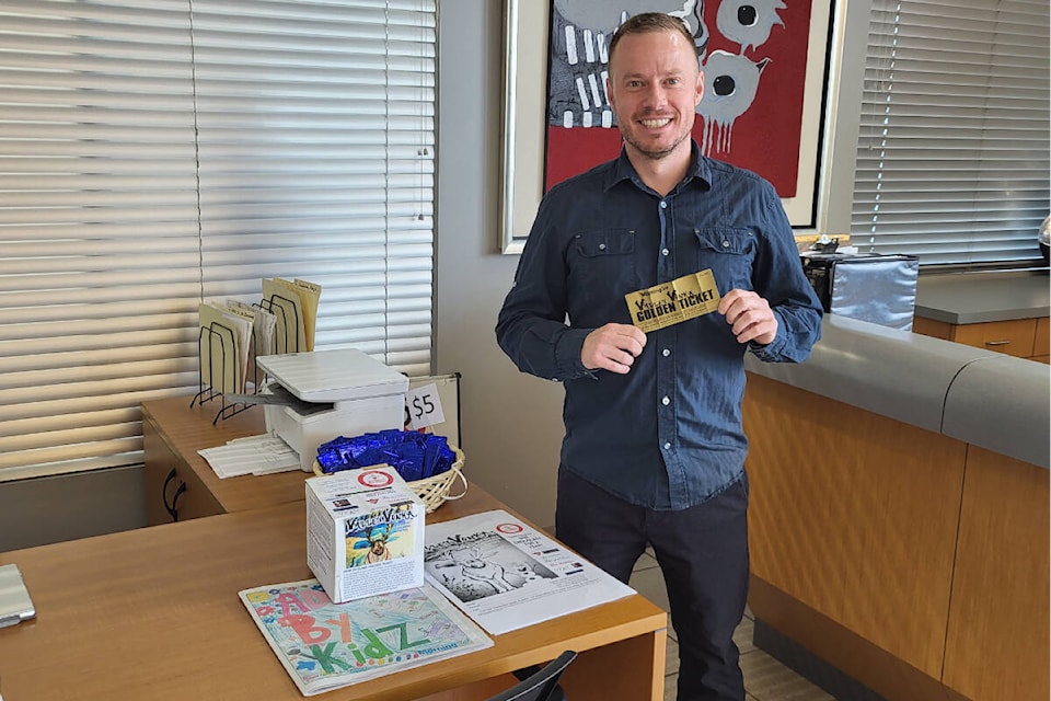 Vernon Nissan finance manager Mike Manka bought a bunch of Valley Vonka chocolate bars for his sales staff, and found the first of five Golden Tickets to be had in a Morning Star promotion/fundraiser for Jumpstart. (Roger Knox - Morning Star)