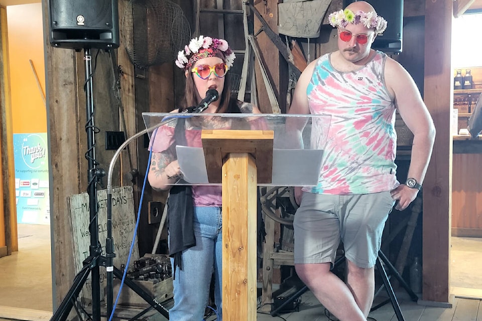 Madison Reynolds (left) and Marc Szarek, board members of the Armstrong Spallumcheen Chamber of Commerce, hosted the Community Excellence Awards Thursday, May 11, in Spallumcheen at Farmstrong Cider Co., where Woodstock was the event theme. (Roger Knox - Morning Star)