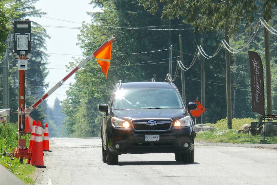 Traffic on 240th Street between 72nd and 80th Avenue in Langley was restricted to one alternating lane Sunday, May 14, after what a Township advisory described as “a road surface failure,” that a Township councillor said was the second sinkhole in recent weeks.(Dan Ferguson/Langley Advance Times)