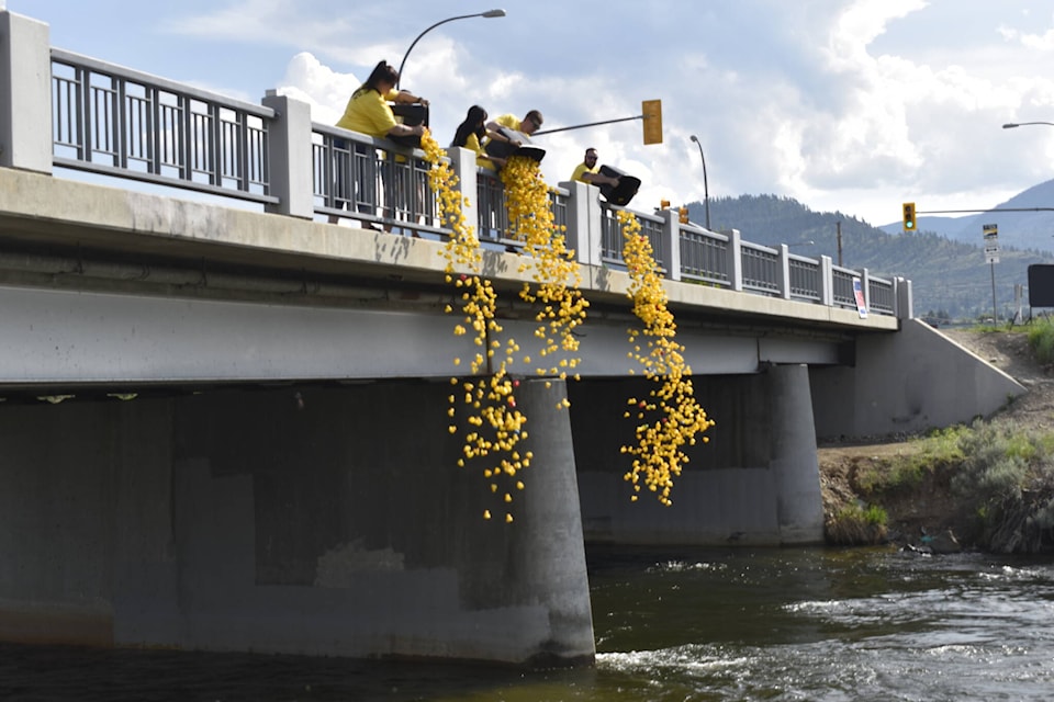 Thousands of rubber ducks were drooped in the Penticton Channel on Saturday, May 27, for Operation Duck Drop. (Logan Lockhart- Western News)