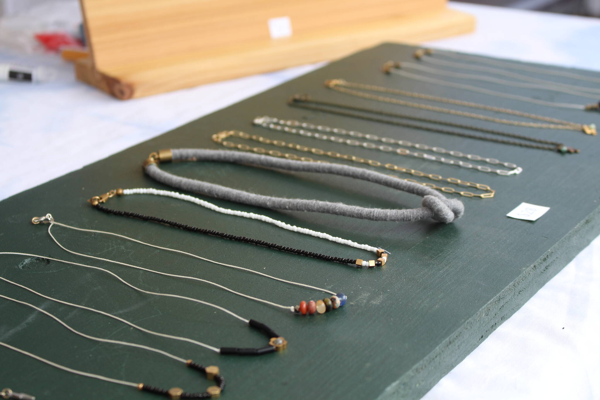 Some of Wiesmanns necklaces on display at the market. (Zachary Delaney/Revelstoke Review)