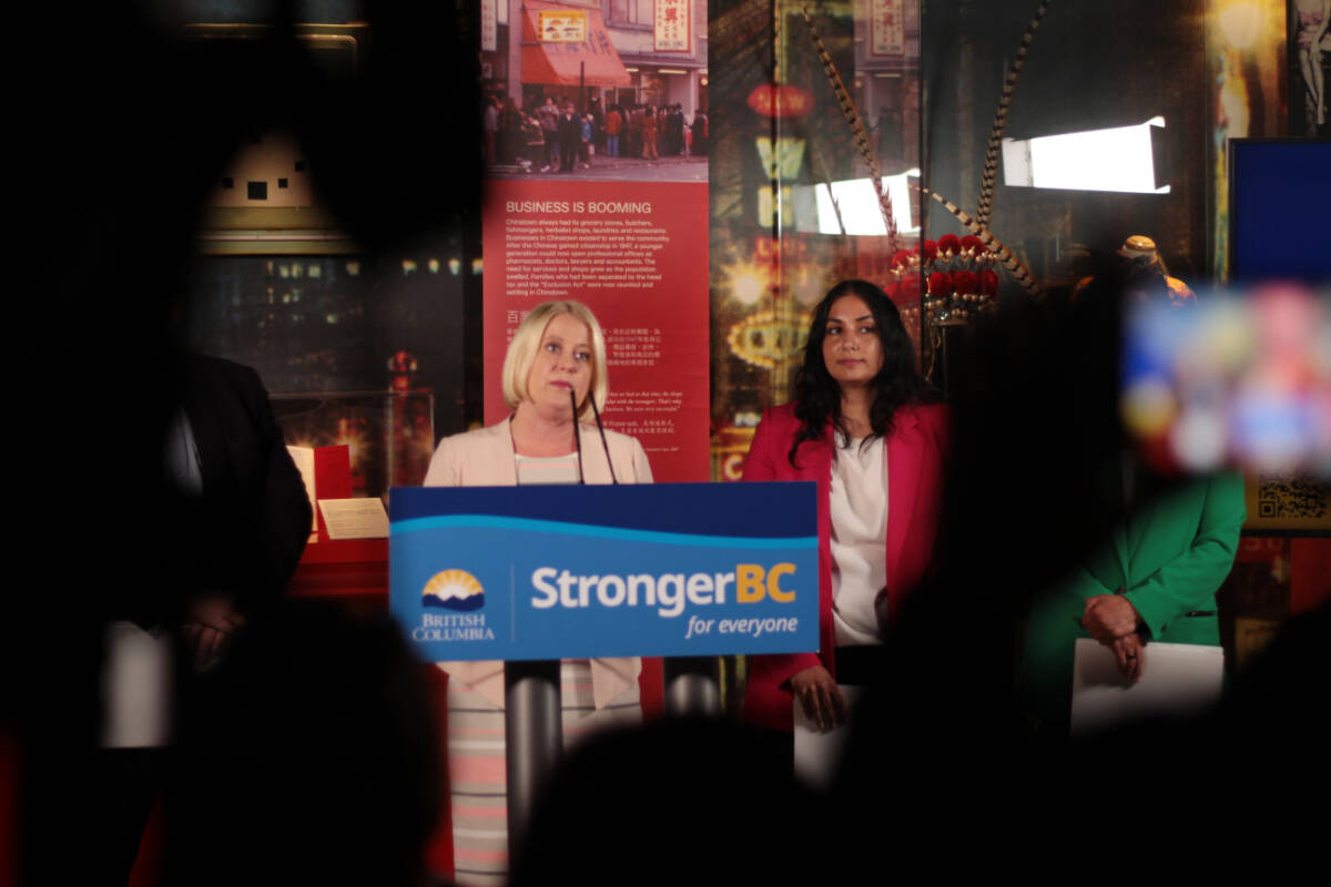 Citizens Services Minister Lisa Beare, left, speaks during the launch of B.C.s demographic Survey June 14, 2023 at Vancouvers Chinatown Storytelling Centre. She is joined by Attorney General Niki Sharma (Lauren Collins)