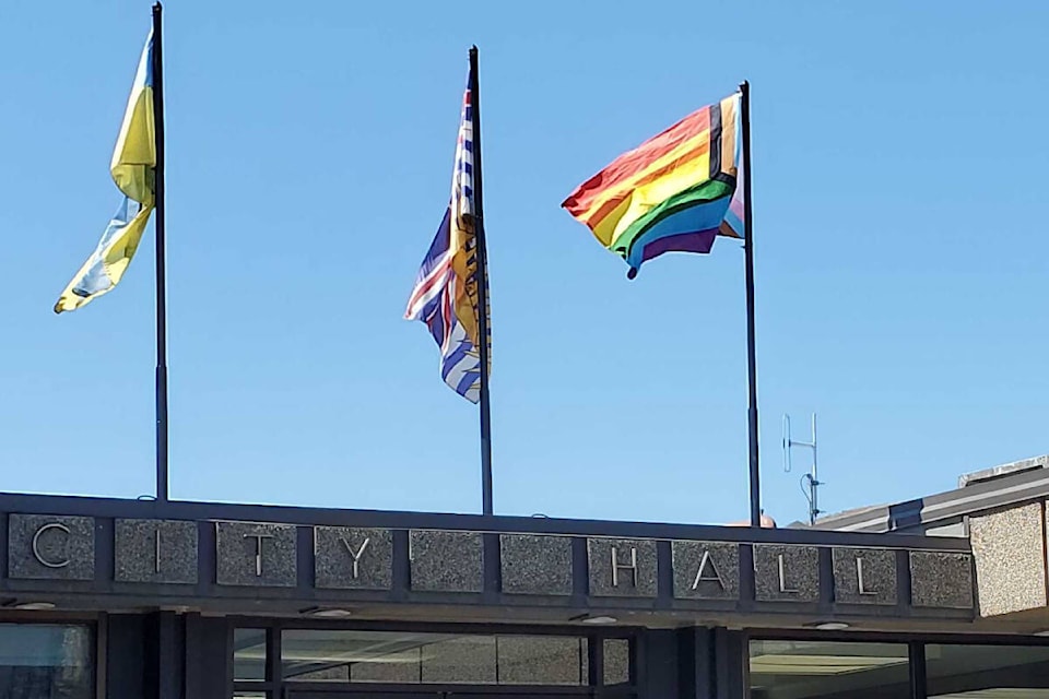 33122814_web1_220811-VMS-pride-flag-raising-PRIDE_2