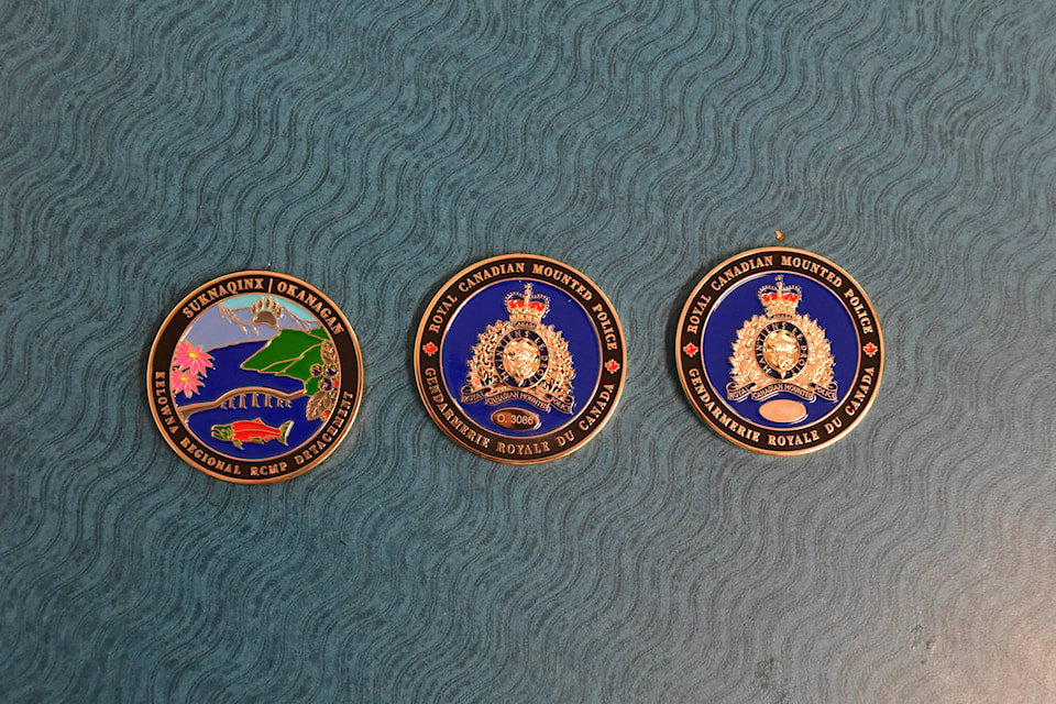 The Kelowna RCMP’s new challenge coin, designed by Central Okanagan school students. (Jordy Cunningham/Capital News)
