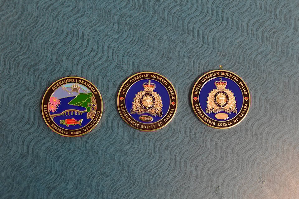 The Kelowna RCMP’s new challenge coin, designed by Central Okanagan school students. (Jordy Cunningham/Capital News)
