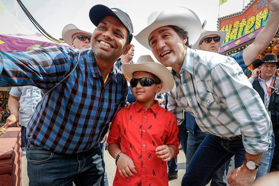 33246412_web1_230707-CPW-Trudeau-port-strike-stampede_1