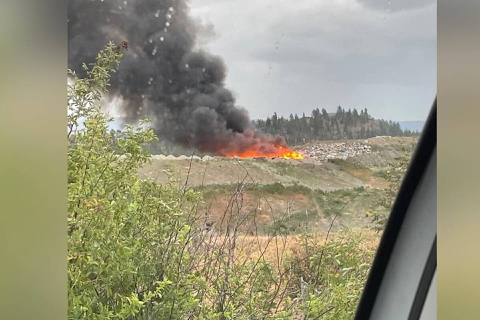 Flames seen rising from the Glenmore Landfill at about 8:45 p.m. Monday. (Facebook)