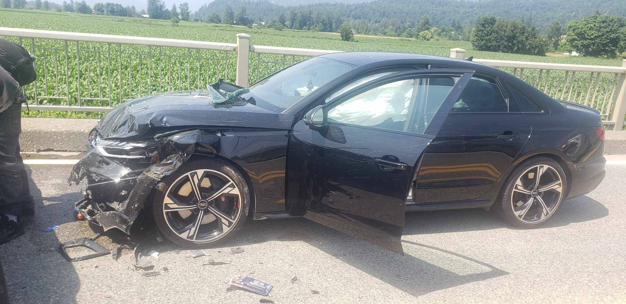 This Audi was the third vehicle hit by a Chrysler 300 in a crash that closed the Agassiz-Rosedale Bridge on July 8, 2023. (Sukh Mattu)