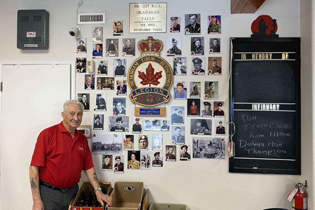 Ed Findlater, the former president of the Okanagan Falls Legion, has seen many changes at the legion since becoming a member in 1983. He reflected on the Legions history while referencing his friends on the wall. (Logan Lockhart- Western News)