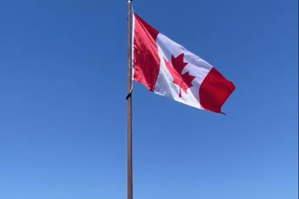 The Canadian flag was successfully raised to one of two new poles erected on Saddle Mountain in the Village of Lumby by the Lumby Air Force Flying Club on Canada Day.