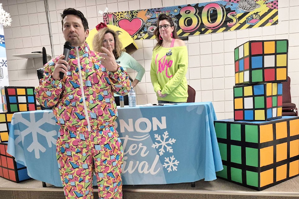 Vernon Winter Carnival Society director Josh Winquist (front), accompanied by society president Laurell Cornell (left) and society executive director Lisa Fenyedi did not disclose (wisely) where he got his outfit from at the official Vernon Winter Carnival Launch Night Wednesday, Jan. 22, at the Vernon Army, Navy, Air Force Spitfire Unit #5. The theme for Carnival, which runs Feb. 7-16, is Back to the 80s.