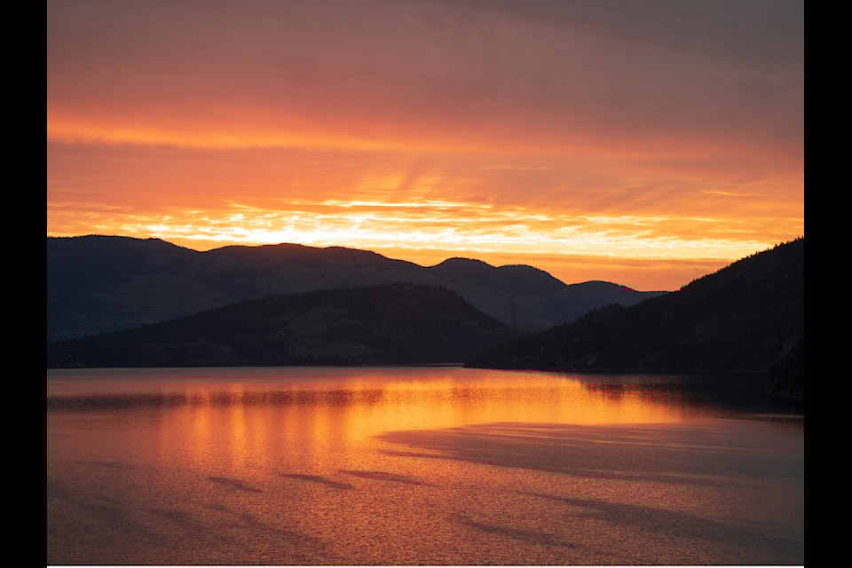 The sun rises above Kalamalka Lake Sunday, June 9. 
