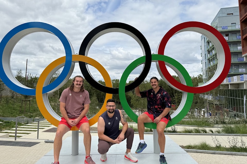 Victoria's Adam Keenan (centre) with fellow Canadian hammer throwers, gold-medal-winning Ethan Katzberg (left) and Rowan Hamilton (right).