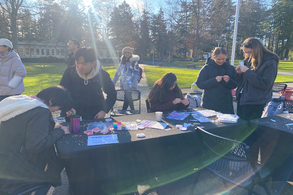 Students enjoy the friendship bracelet station at UVic's Giving Tuesday.