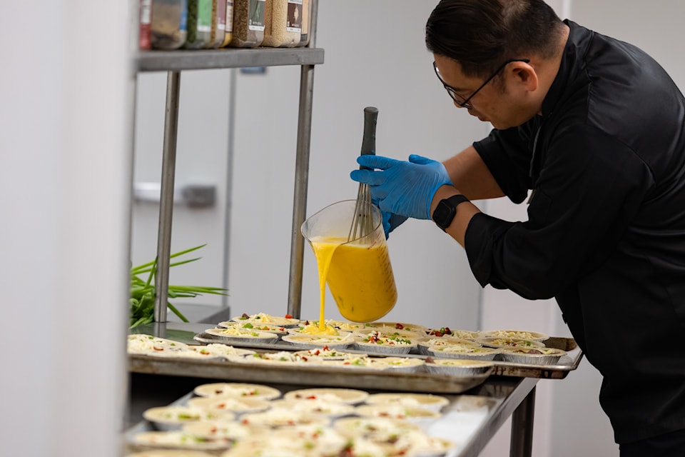 Cool Aid chef Jerry Kwan prepares food using fresh meat, produce and other products sourced locally through th