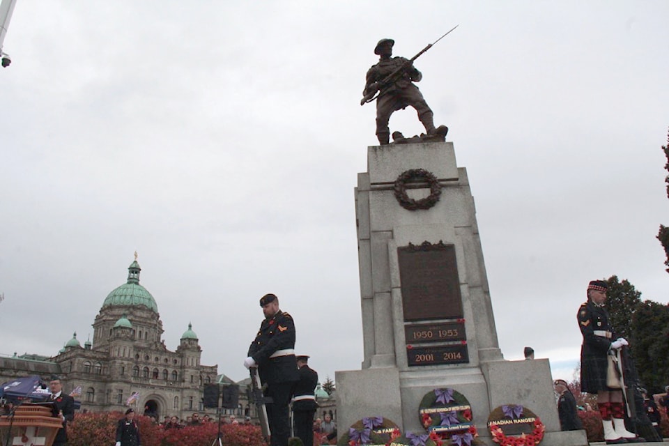 Thousands gather for the Remembrance Day service on Nov. 11 at the cenotaph outside the provincial buildings in Victoria.
