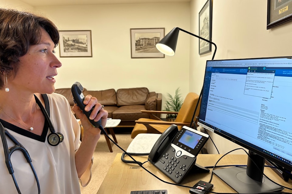 Dr. Chloe Lemire-Elmore, Victoria General's chief of staff and medical director, using a voice-to-text software, which allows her to dictate patient information into the new computerized system.