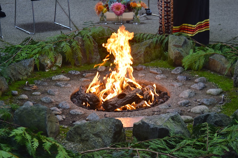 The ceremonial cedar around the fire pit occupies the center of Na’tsa’maht.