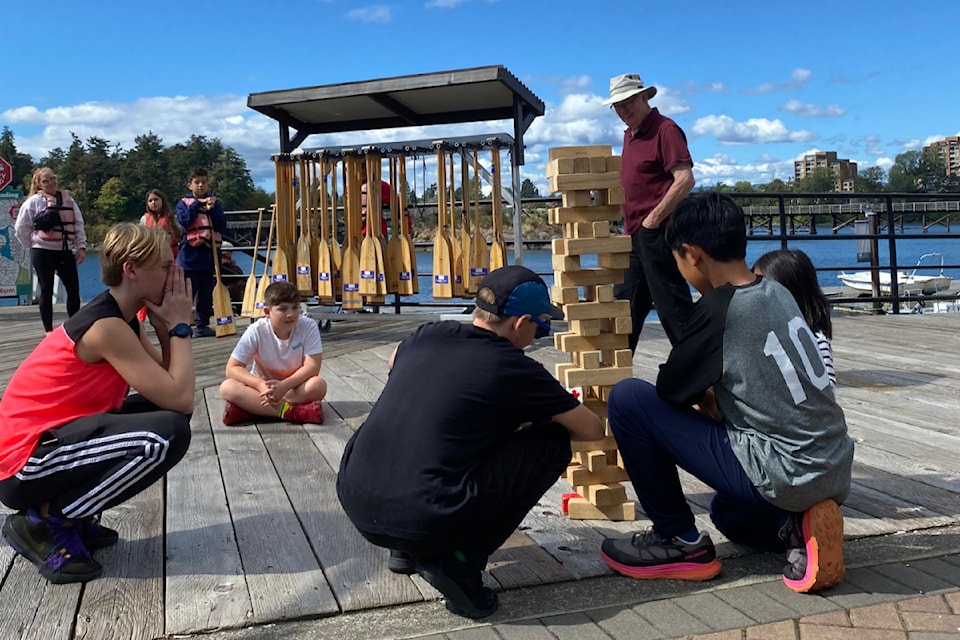 Newspaper carriers who deliver Victoria News, Saanich News, Oak Bay News, Peninsula News Review, Goldstream Gazette and the Sooke News Mirror to doorsteps across the region celebrate a day on the water at the Fairway Gorge Paddling Club.
