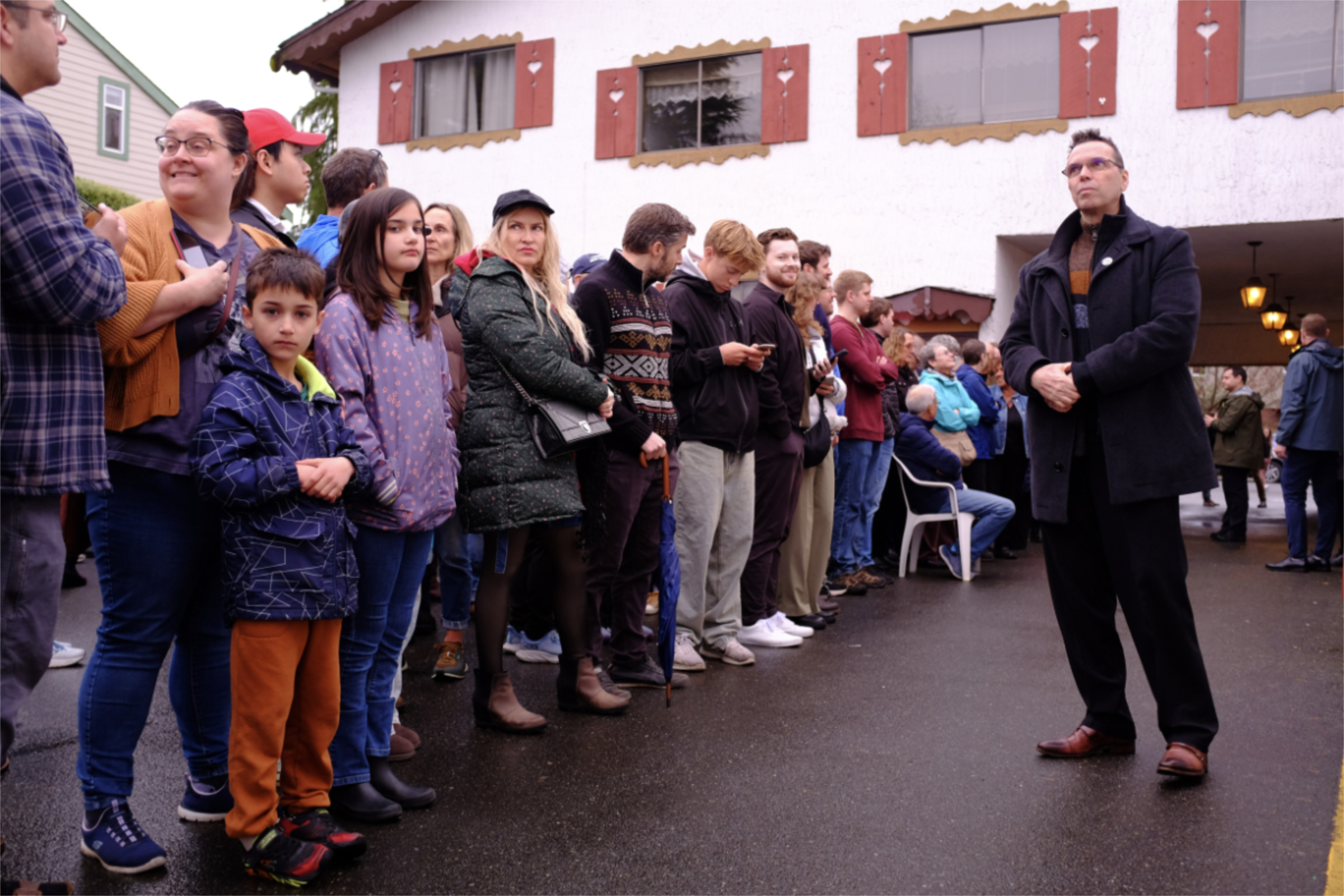 A crowd patiently waits outside the Victoria Edelweiss Club to see Mark Carney during his first visit to B.C. since the federal election campaign began 14 days ago.