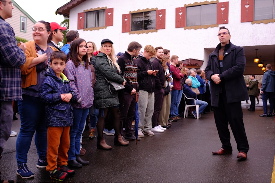 A crowd patiently waits outside the Victoria Edelweiss Club to see Mark Carney during his first visit to B.C. since the federal election campaign began 14 days ago.