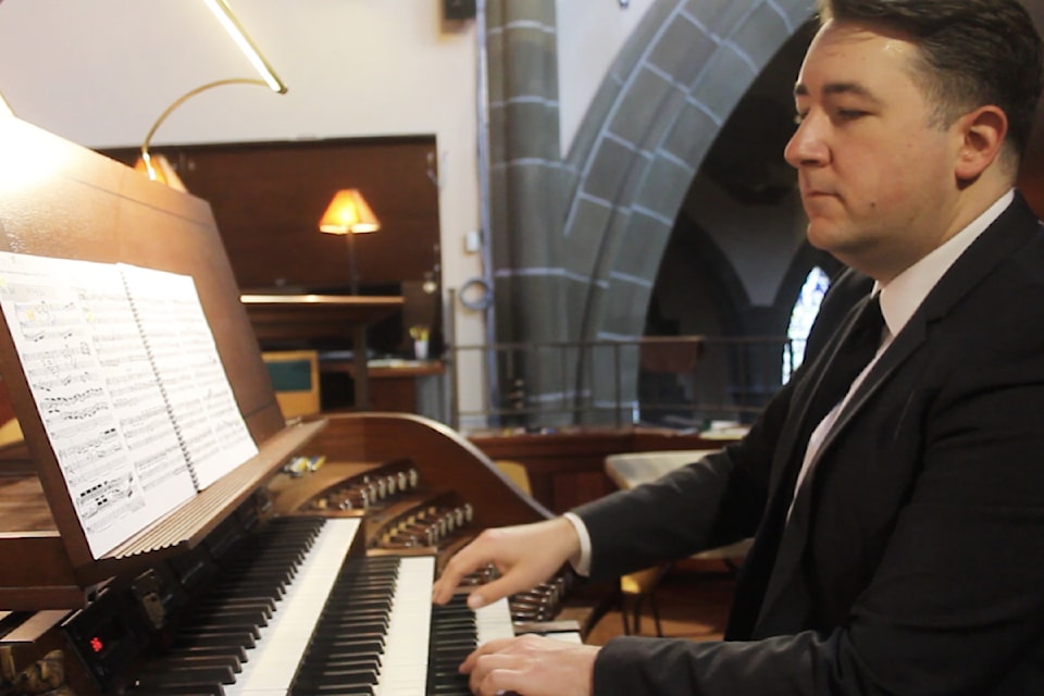 Mark McDonald plays the 20-year-old pipe organ at Christ Church Cathedral.