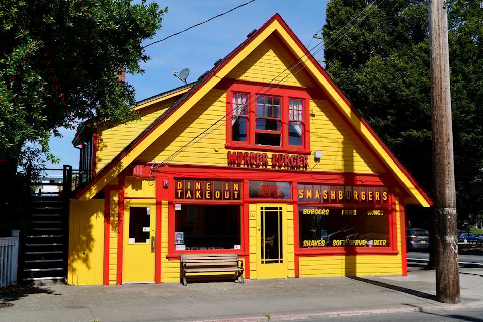Murder Burger now occupies the historic corner at 332 Menzies St., sporting a bright yellow exterior as part of its bold rebrand.