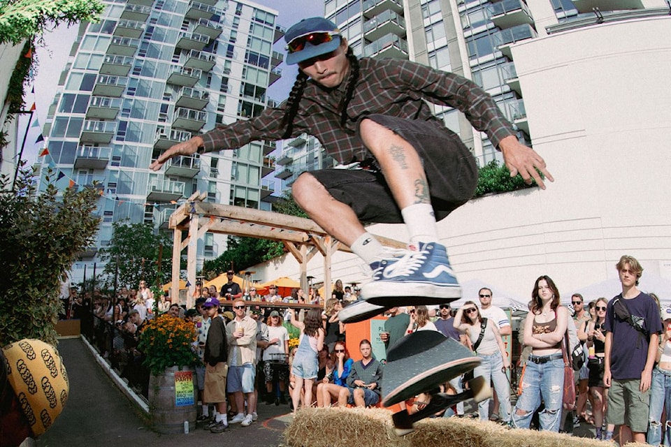 A skateboarder clears a keg during last year’s high-energy skate contest at Boomtown’s block party.