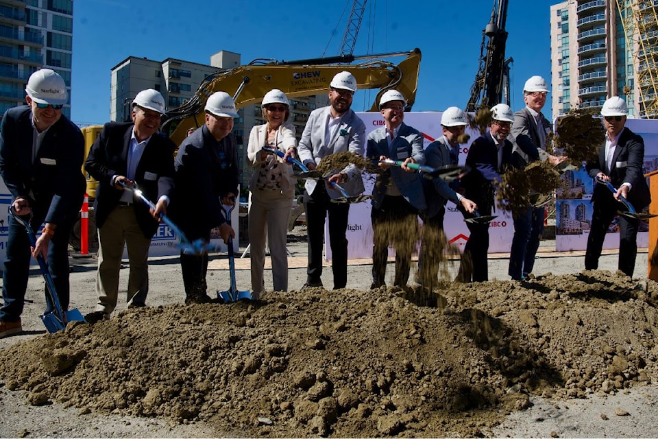 David Chalmers, Mariano Bocchicchio, Mark Aldridge, Coleen Volk, Will Greaves, Daniel Drimmer, Peter Kuretzky, Jeff Bray, Dave Thompson, and Howard Paskowitz break ground on the first phase of Harris Green Village in downtown Victoria.