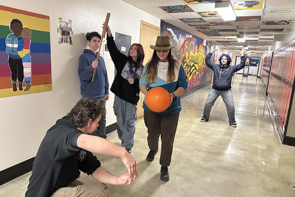The Esquimalt High Atom Smashers play out the expectations of their robot during the planning phase ahead of FTC competition.