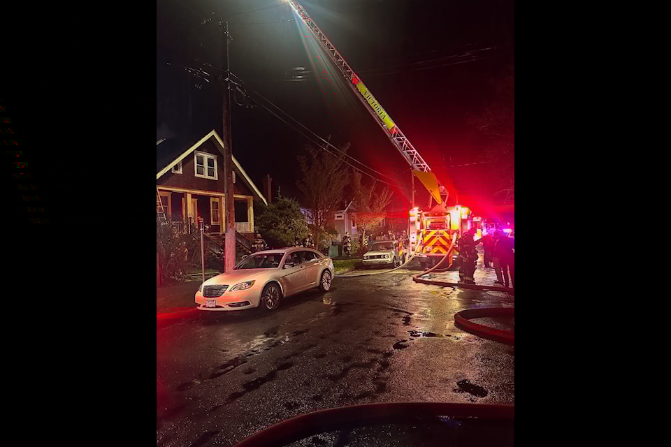 Fire crews douse a blaze in the Oaklands neighbourhood of Victoria in the early hours of Jan. 10. 